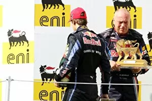 Hungarian Gallery: Formula One World Championship: Third placed Sebastian Vettel Red Bull Racing leaves the podium
