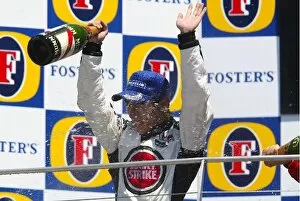 Images Dated 22nd June 2004: Formula One World Championship: Third placed Takuma Sato BAR celebrates his first podium finish