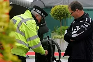 Images Dated 7th July 2005: Formula One World Championship: Police check bags of Frank Dernie Williams Special Projects