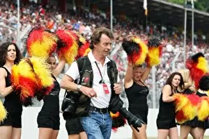 Images Dated 25th July 2010: Formula One World Championship: Pompom girls cheer Crispin Thruston Photographer