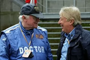 Images Dated 27th August 2004: Formula One World Championship: Professor Sid Watkins F1 Doctor talks with Herbie Blash FIA Observer