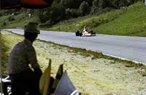 Images Dated 25th March 2003: Formula One World Championship: A race marshal watches Emerson Fittipaldi McLaren M23