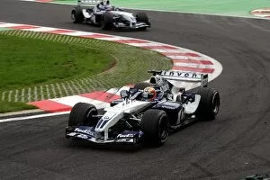 Images Dated 29th August 2004: Formula One World Championship: Race retiree Antonio Pizzonia Williams FW26 leads team mate Juan