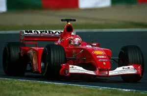 Images Dated 15th October 2001: Formula One World Championship: Race winner and 2001 World Champion Michael Schumacher Ferrari F1