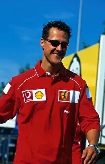 Images Dated 22nd July 2002: Formula One World Championship: Race winner and 2002 F1 world champion Michael Schumacher Ferrari