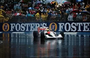 Images Dated 30th August 2001: Formula One World Championship: Race winner Ayrton Senna McLaren MP4 / 6 leads in the appalling