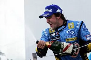 Japan Gallery: Formula One World Championship: Race winner Fernando Alonso Renault celebrates on the podium