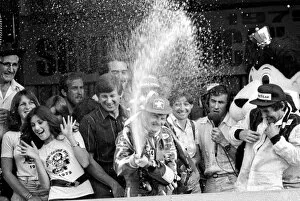 Images Dated 15th January 2010: Formula One World Championship: Race winner Gilles Villeneuve Ferrari sprays the champagne