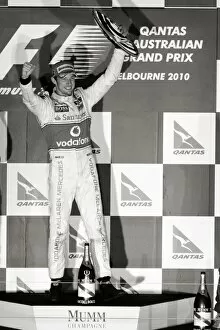Formula One World Championship: Race winner Jenson Button McLaren celebrates on the podium