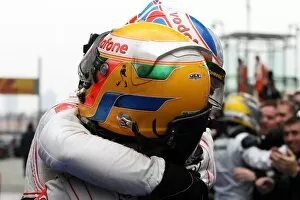 Chinese Gallery: Formula One World Championship: Race winner Jenson Button McLaren celebrates with team mate Lewis