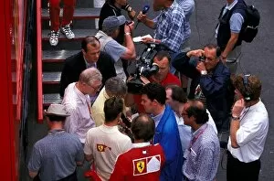 Formula One World Championship: Race winner Michael Schumacher Ferrari is interviewed by the media