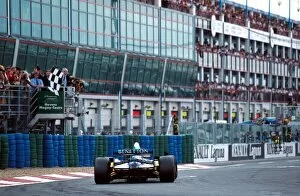 Formula One World Championship: Race winner Michael Schumacher Benetton B195 takes the chequered flag