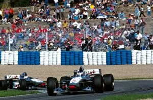 Images Dated 18th May 2001: Formula One World Championship: Race winner Mika Hakkinen leads McLaren team mate David Coulthard