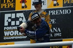 Spain Collection: Formula One World Championship: Race winner Nigel Mansell celebrates his victory with Michael