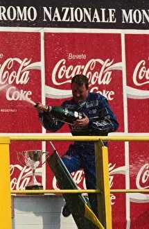 Italy Collection: Formula One World Championship: Race winner Nigel Mansell celebrates on the podium