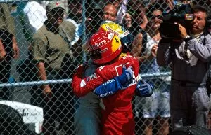 Images Dated 12th February 2002: Formula One World Championship: Race winner Ralf Schumacher Williams is hugged by his brother
