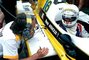 Images Dated 20th February 2007: Formula One World Championship: Race winner Rene Arnoux Renault talks with an engineer