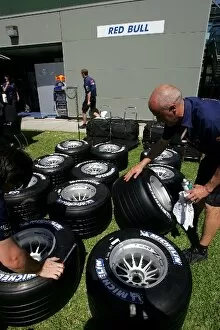 Images Dated 3rd March 2005: Formula One World Championship: Red Bull mechanics prepare tyres