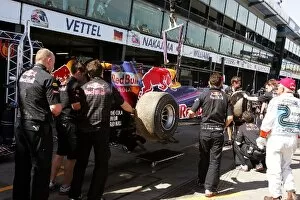Formula One World Championship: The Red Bull Racing RB5 of Sebastian Vettel Red Bull Racing is returned to the pits