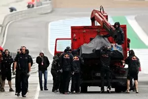 Formula One World Championship: The Red Bull Racing RB6 of Mark Webber Red Bull Racing is recovered to the pits