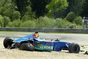 Injured Collection: Formula One World Championship: The remains of Nick Heidfelds Sauber C21 following his huge accident