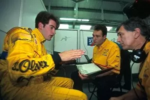 Images Dated 4th July 2001: Formula One World Championship: Ricardo Zonta talks with Jordan engineers following his first day