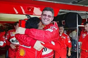 2004 Collection: Formula One World Championship: Ross Brawn Ferrari Technical Director celebrates with Balbir Singh