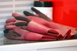Images Dated 22nd August 2009: Formula One World Championship: Rubber gloves in the Ferrari garage