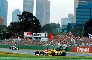 Images Dated 6th March 2001: Formula One World Championship: Rubens Barrichello Ferrari F1 2001 tries to pass Heinz-Harald