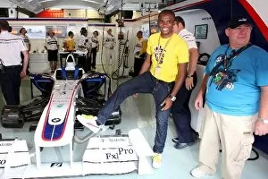 Images Dated 8th May 2009: Formula One World Championship: Samuel Eto o FC Barcelona Football Player in the BMW Sauber garage