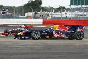 Images Dated 10th July 2010: Formula One World Championship: Sebastian Vettel Red Bull Racing RB6 runs wide after suffering a