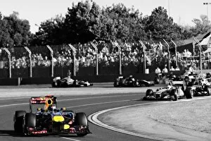 Black and White Images Collection: Formula One World Championship: Sebastian Vettel Red Bull Racing RB7 leads at the start of the race