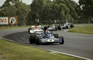 Team Mates Collection: Formula One World Championship: Second placed Francois Cevert Tyrrell 006 leads the race from pole