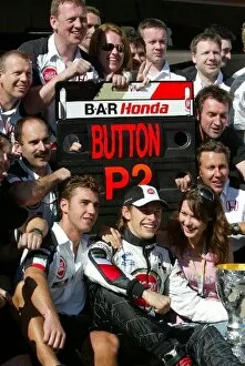 2004 Collection: Formula One World Championship: Second placed Jenson Button BAR celebrates with the BAR team