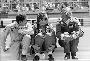 Nurburgring Collection: Formula One World Championship: Second placed Jody Scheckter Tyrrell talks with Niki Lauda Ferrari