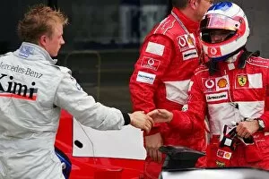 2004 Collection: Formula One World Championship: second placed Kimi Raikkonen McLaren congratulates Rubens