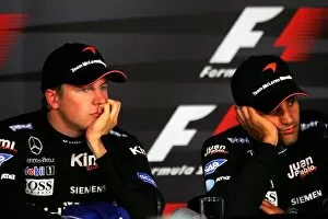 Images Dated 25th September 2005: Formula One World Championship: second placed Kimi Raikkonen McLaren Mercedes talks with Juan