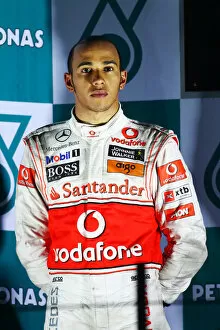 Images Dated 24th October 2010: Formula One World Championship: Second placed Lewis Hamilton McLaren on the podium