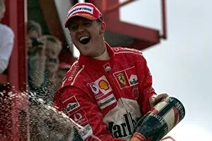Images Dated 7th September 2006: Formula One World Championship: Second placed Michael Schumacher Ferrari celebrates his seventh