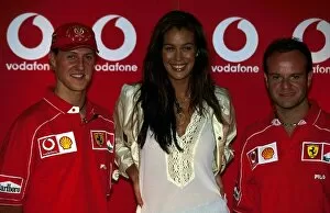 2002 Collection: Formula One World Championship: Second placed Michael Schumacher Ferrari; the face of Vodafone