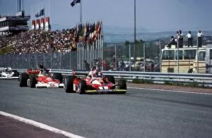 James Hunt 1976 Collection: Formula One World Championship: Second placed Niki Lauda Ferrari 312T2 leads James Hunt McLaren