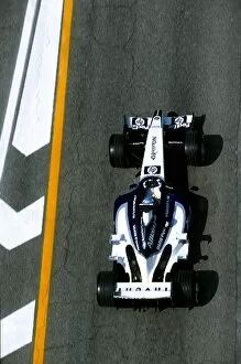 Aerial Gallery: Formula One World Championship: Seventh placed Juan Pablo Montoya Williams BMW FW25 exits the pit lane