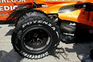 Images Dated 6th April 2007: Formula One World Championship: The shredded rear Bridgestone tyre of Christian Albers Spyker