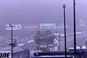 Formula One World Championship: Spa is shrouded in morning mist, causing the first warmup session to be cancelled