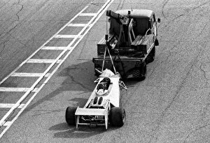 Images Dated 15th December 2009: Formula One World Championship: The Surtees TS20 of Vittorio Brambilla is taken away from
