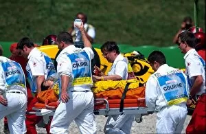 Images Dated 13th May 2002: Formula One World Championship: Takuma Sato Jordan is removed from the circuit after a huge accident