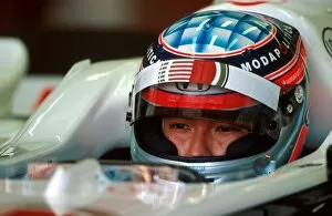 Images Dated 23rd August 2001: Formula One World Championship: Test driver Takuma Sato BAR Honda 003 prepares for action