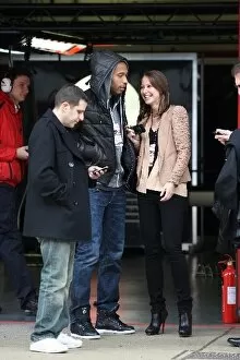 Formula One World Championship: Thierry Henry with his new girlfriend Andrea watch testing in the pitlane
