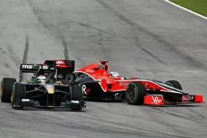 Formula One World Championship: Timo Glock Virgin Racing VR-01 retired from the race and hit Jarno Trulli Lotus T127