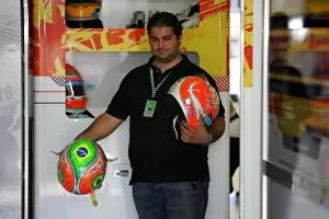 Images Dated 30th October 2008: Formula One World Championship: Tom Castermans, Bell Helmets F1 Co-ordinator with the helmets of